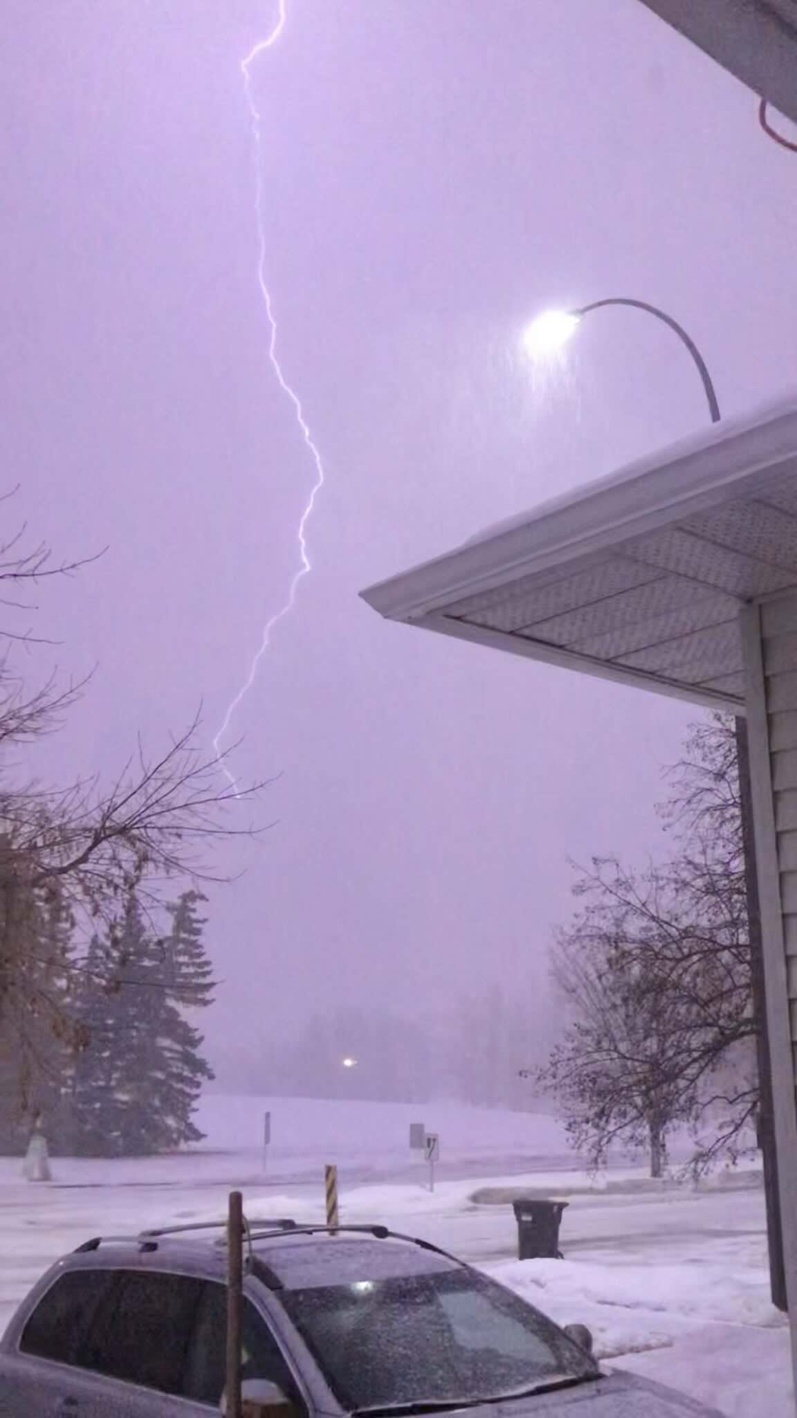 Thundersnow, a snowstorm with thunder and lightning, over Calgary, Canada