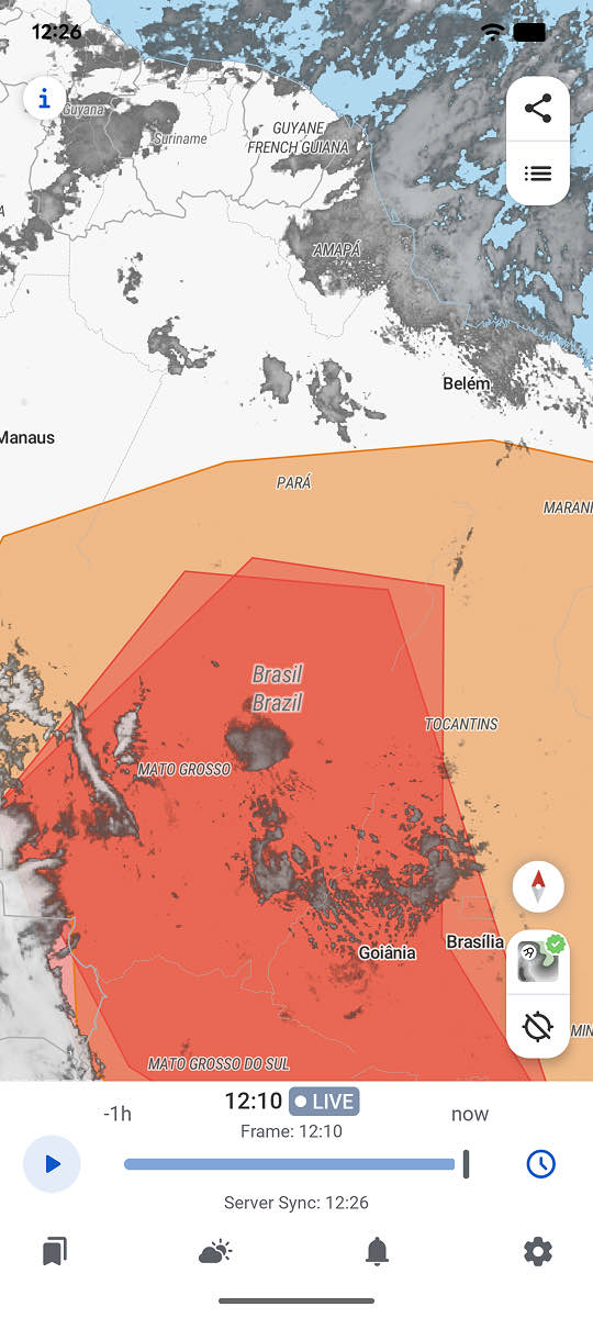 Alertas oficiais sobrepostos ao mapa do RainViewer no Centro-Oeste do Brasil, com áreas em laranja e vermelho sobre Mato Grosso, Goiás e o sul do Pará