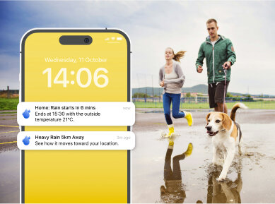 Picture of phone with Rain Viewer app open showing hourly weather forecast